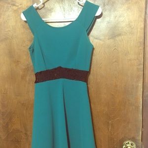 Green formal mini dress with lace waist
